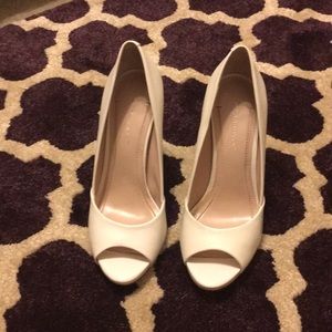 White open-toed pumps